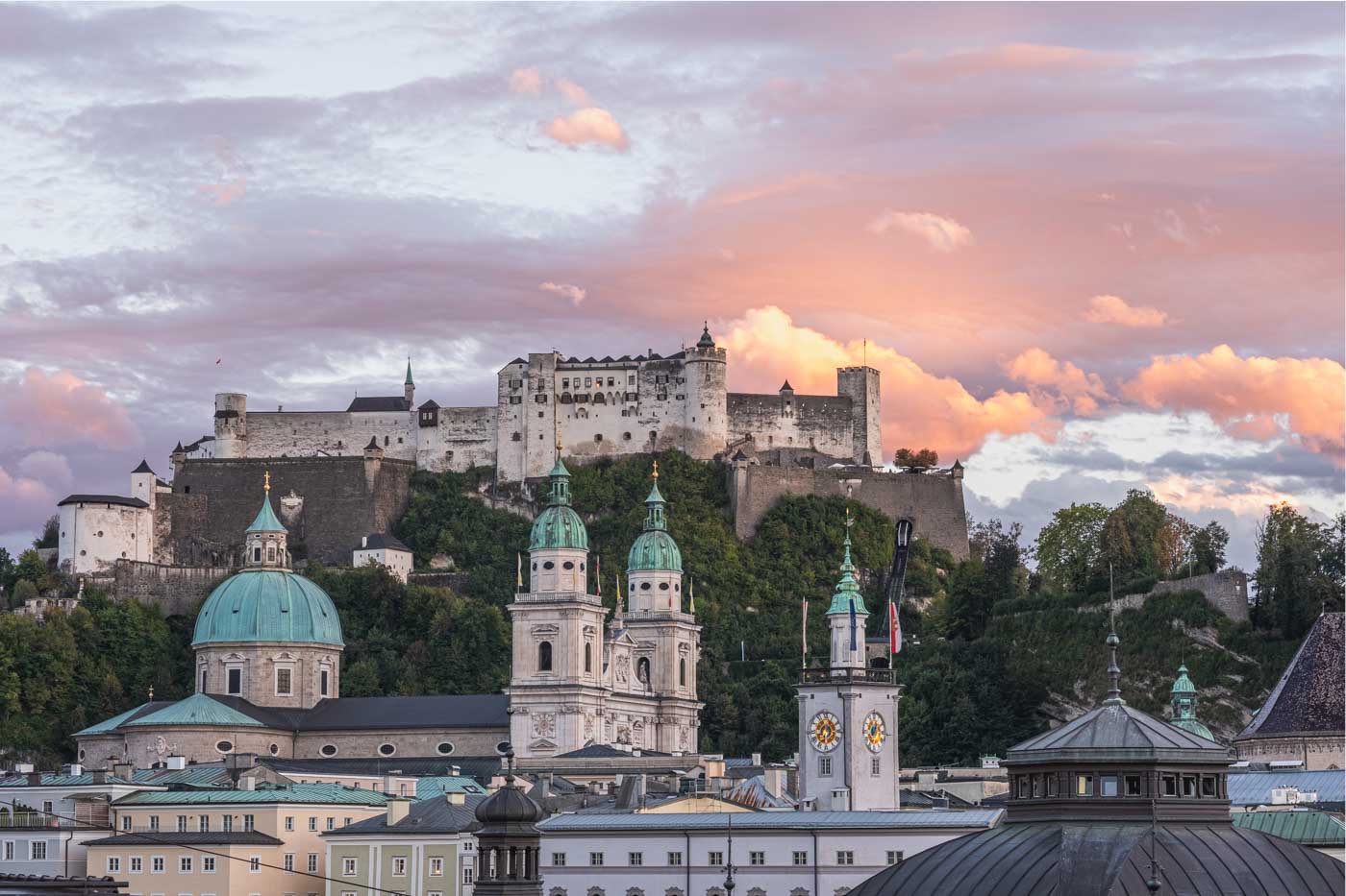Hohensalzburg fortress over the old town at sunrise